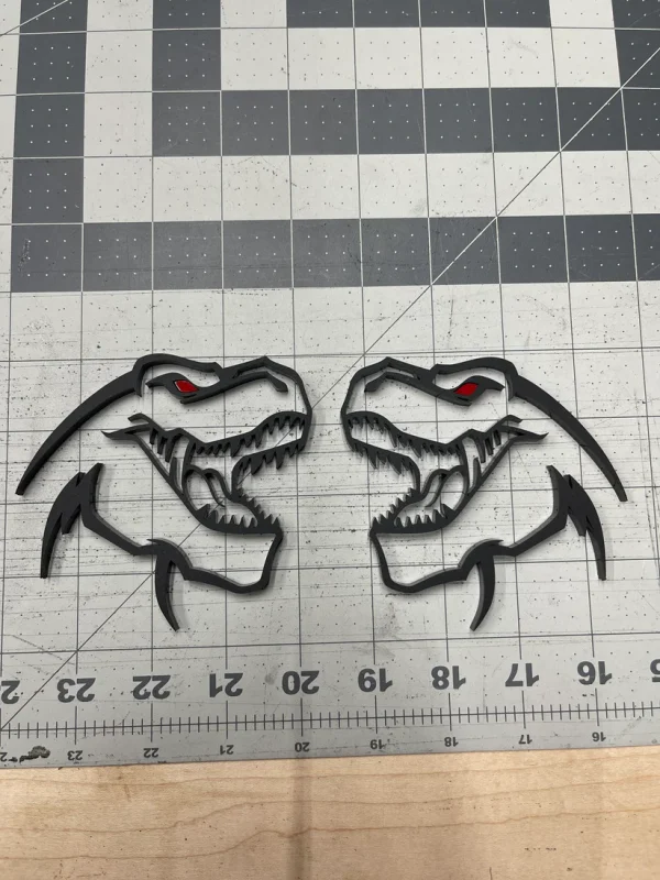 Alternative view of TREX head badge pair