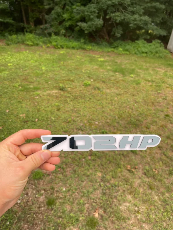 Alternative view of 702HP grille badge